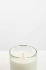 Vegan candle made from a coconut and soy wax and scented with natural cardamom and lemongrass. Made in London.