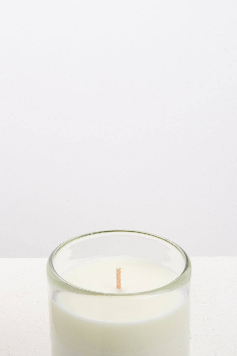 Vegan candle made from a coconut and soy wax and scented with natural coriander and bergamot. Made in London.